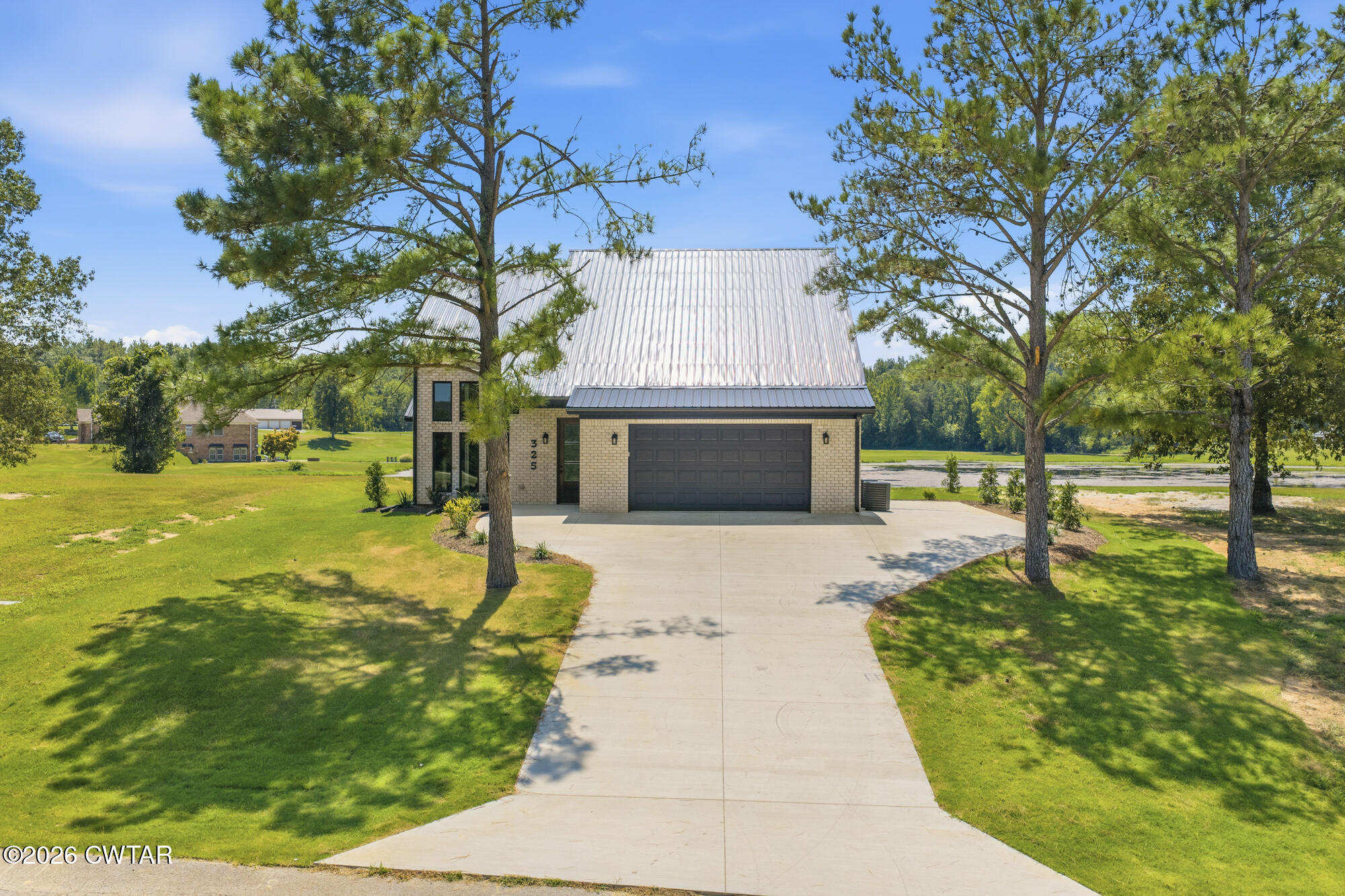 325 Golfview Lane Decaturville, TN 38329 - Photo 2 of 31 DJI_20260818134923_0974_D