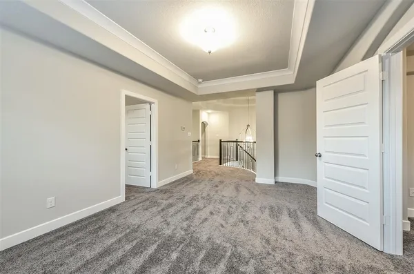 a room with furniture and a flat screen tv