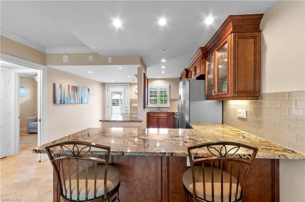 $575,000 | 414 Broad Avenue South, Unit H414, Naples, FL 34102