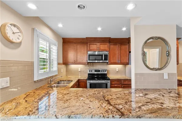 $575,000 | 414 Broad Avenue South, Unit H414, Naples, FL 34102