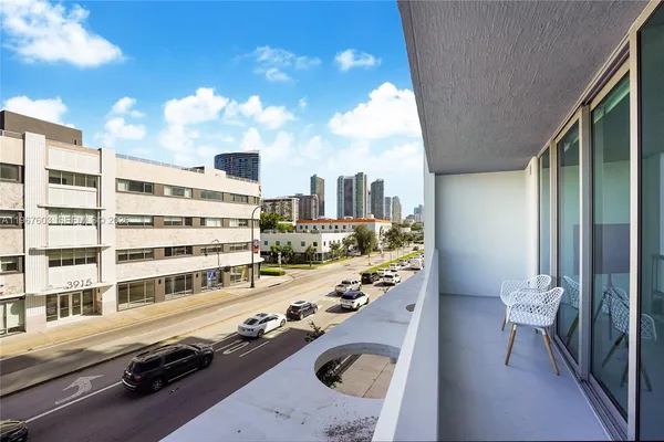 a view of a balcony with city view