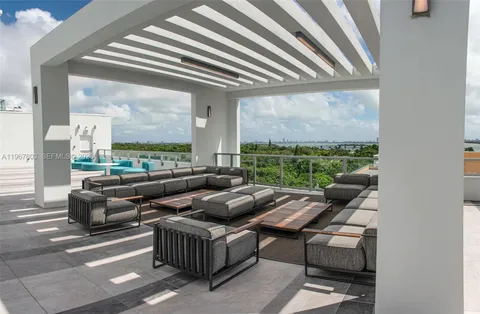 an outdoor space with furniture