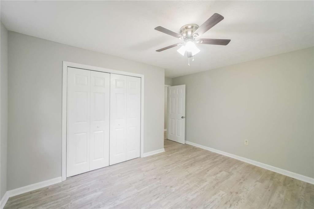 658 Agan Road Bremen, GA 30110 - Photo 12 of 15 a view of an empty room with wooden floor