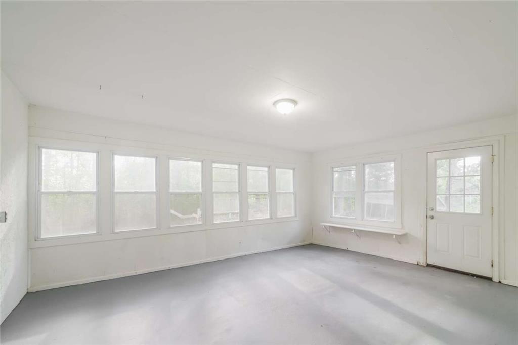 658 Agan Road Bremen, GA 30110 - Photo 14 of 15 an empty room with windows