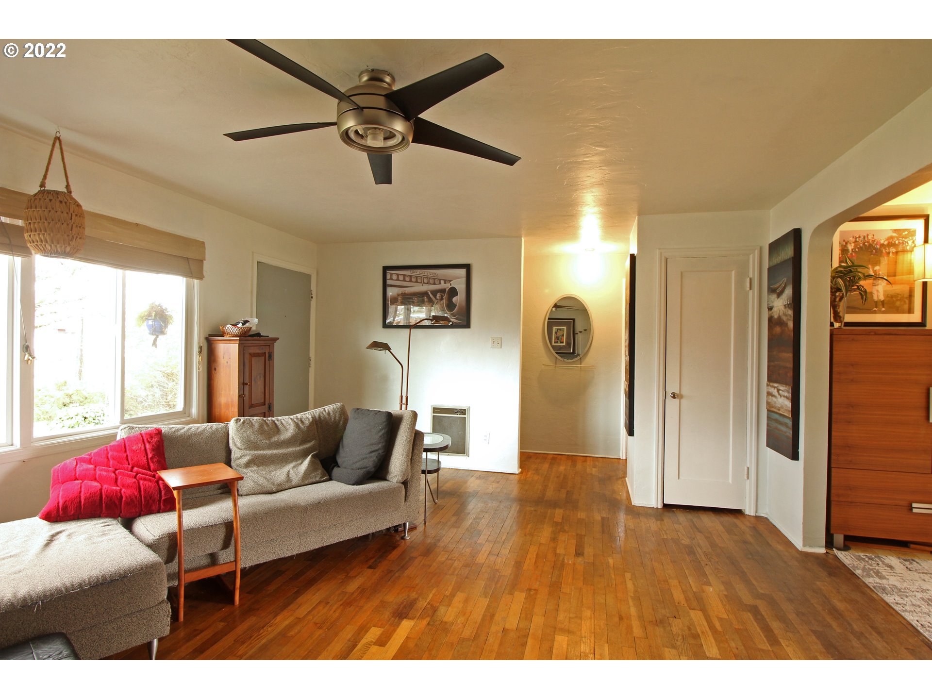 1939 E Street Springfield, OR 97477 - Photo 7 of 32 a living room with furniture and a wooden floor