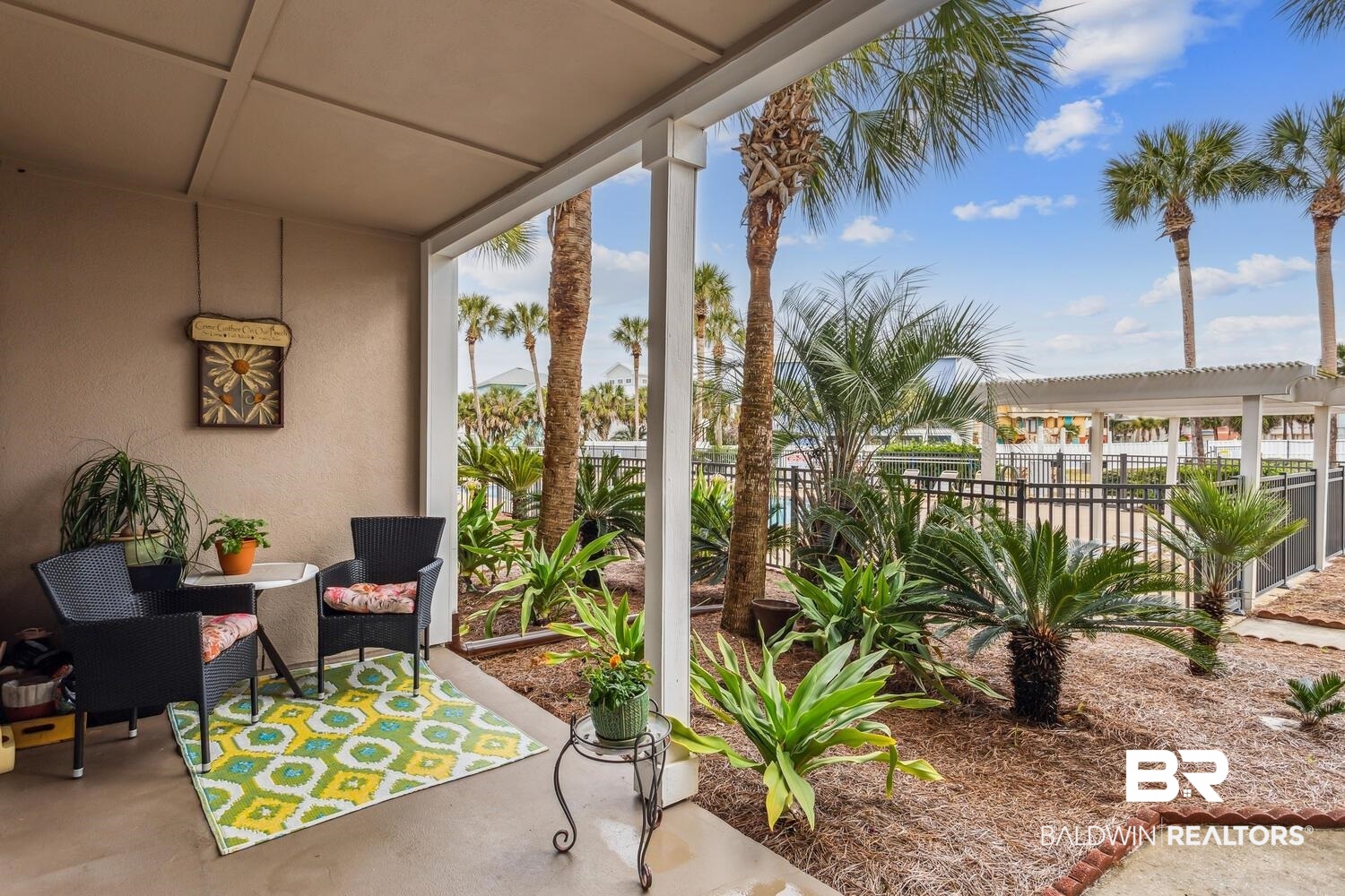 13551 Johnson Beach Road, Unit 112E Pensacola, FL 32507 - Photo 19 of 42 View of sunroom / solarium