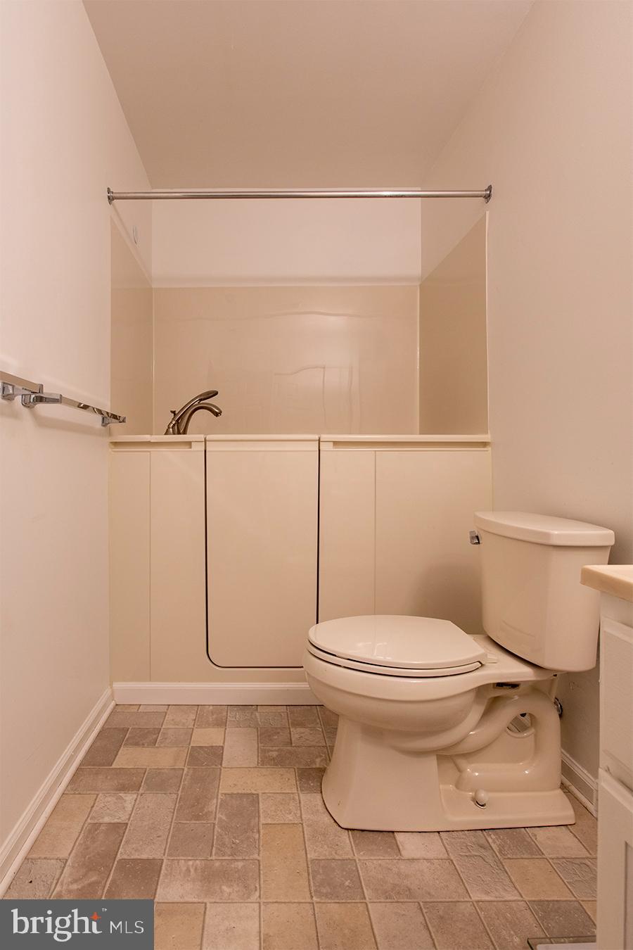 2000 Miller Avenue, Unit 26 Millville, NJ 08332 - Photo 24 of 25 a bathroom with a toilet and a shower