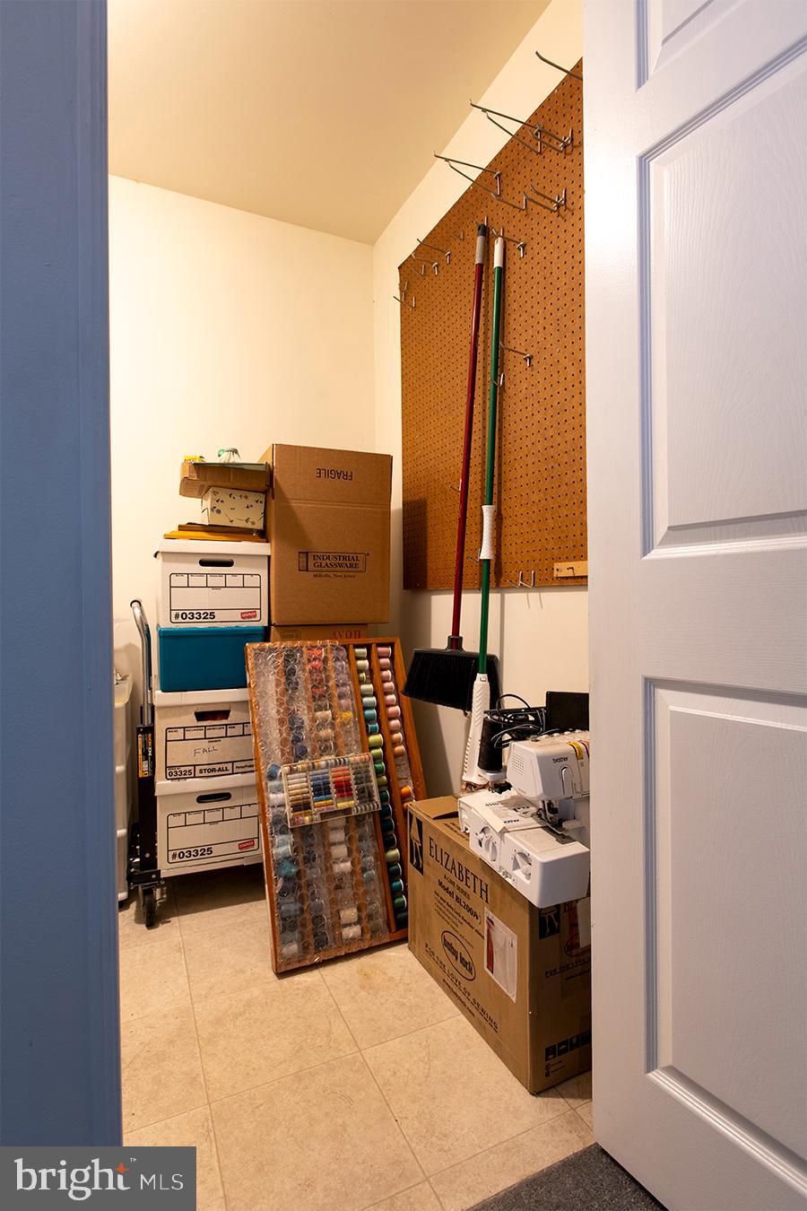 2000 Miller Avenue, Unit 26 Millville, NJ 08332 - Photo 25 of 25 a kitchen with stainless steel appliances kitchen island granite countertop a stove and a refrigerator