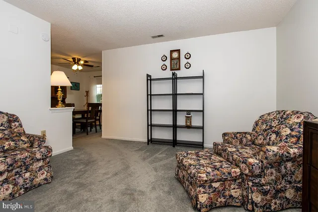 a bedroom with a bed and a cabinets