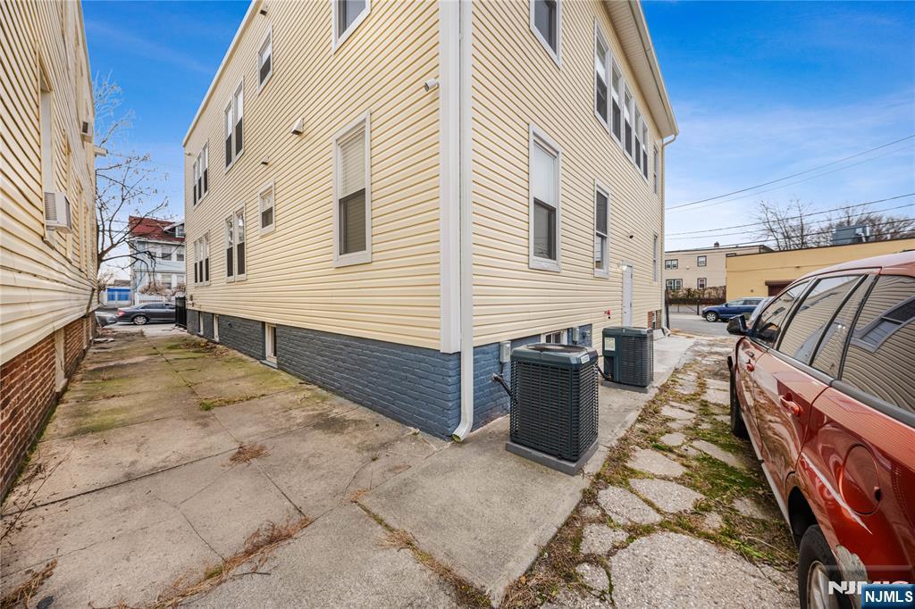 81 Wolcott Terrace Newark, NJ 07112 - Photo 18 of 20 a view of a backyard with sitting area