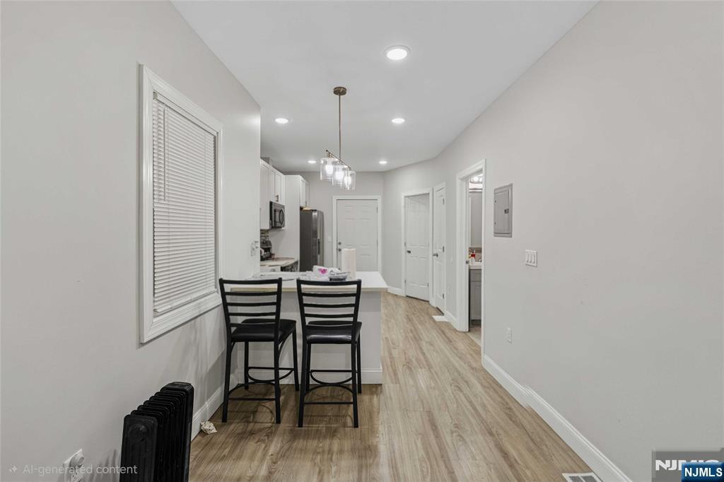 81 Wolcott Terrace Newark, NJ 07112 - Photo 5 of 20 a view of a a dining room with furniture and wooden floor