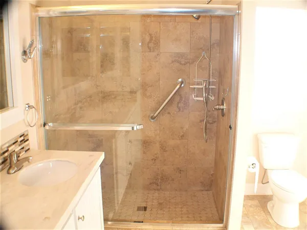 a view of a sink and a mirror