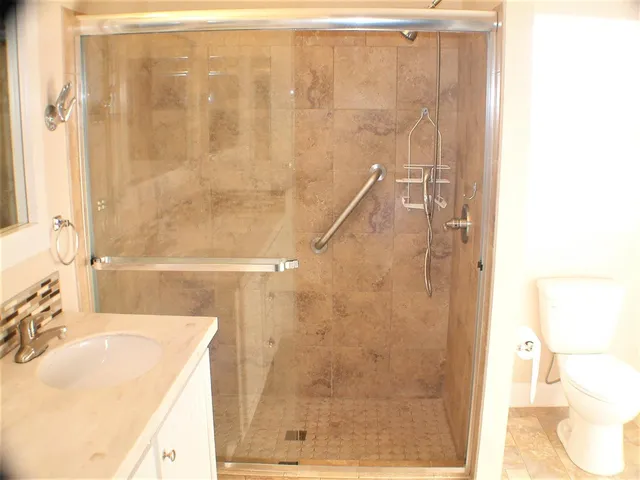 a view of a sink and a mirror