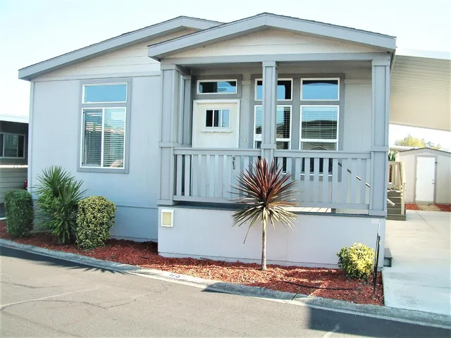 a view of a backyard with plants