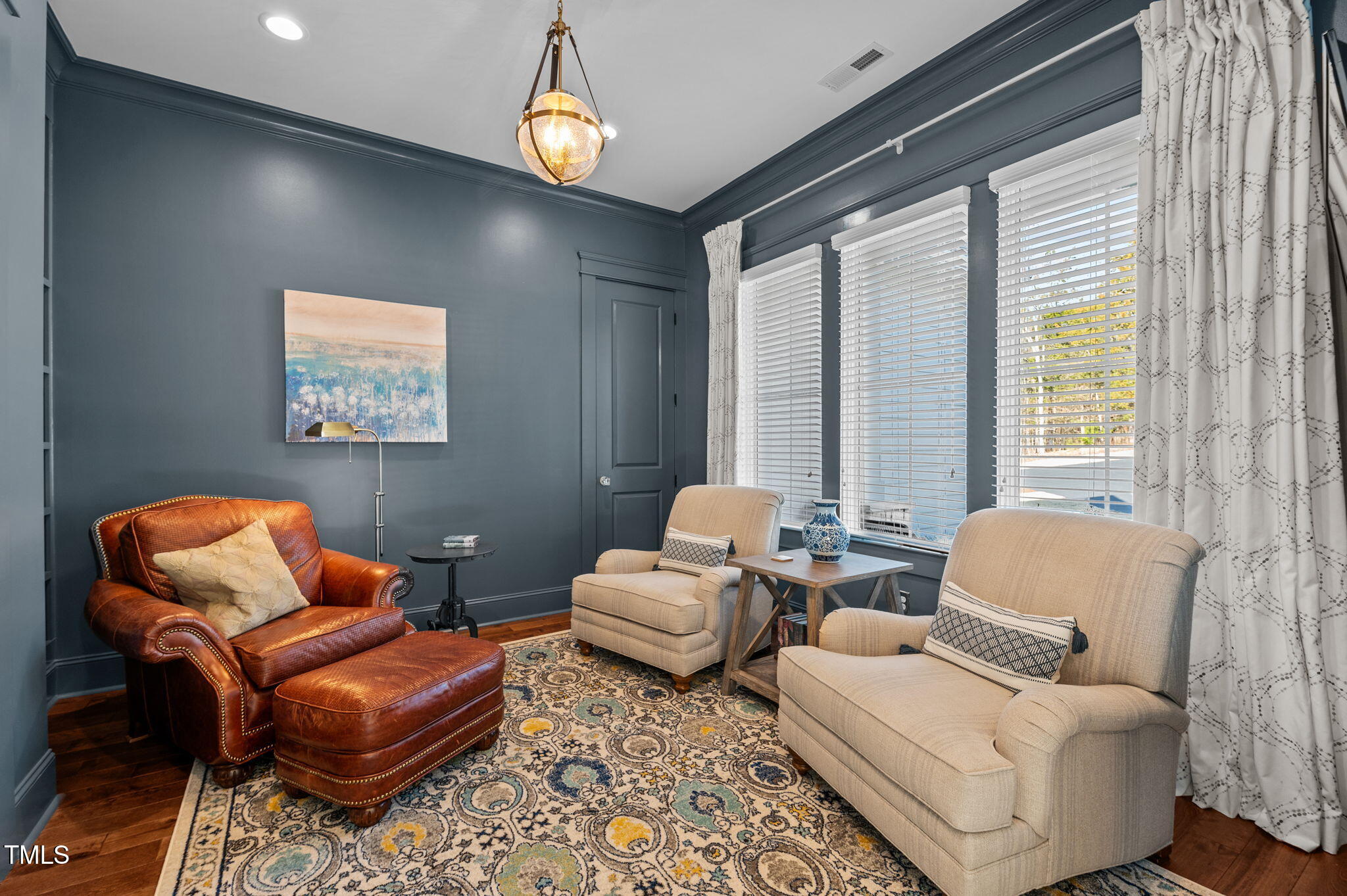 992 Estate Road Semora, NC 27343 - Photo 12 of 77 a living room with furniture a rug and a large window