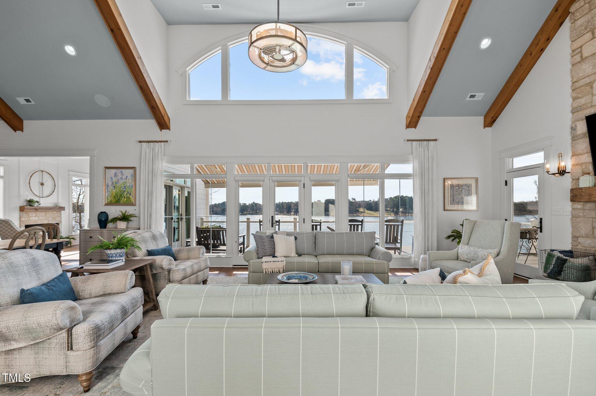992 Estate Road Semora, NC 27343 - Photo 16 of 77 a living room with furniture and a large window