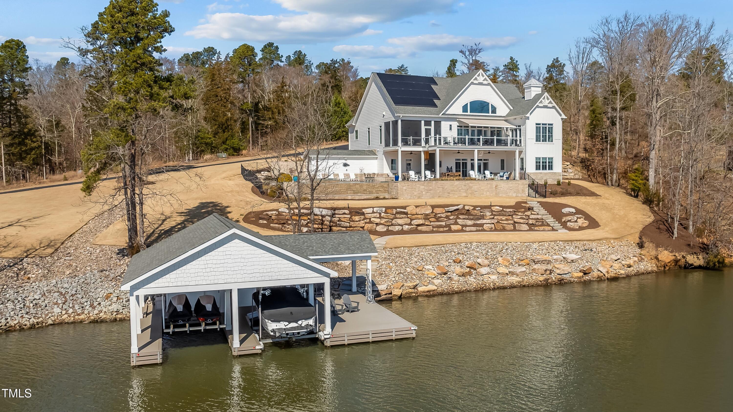 992 Estate Road Semora, NC 27343 - Photo 3 of 77 a front view of a house with a yard