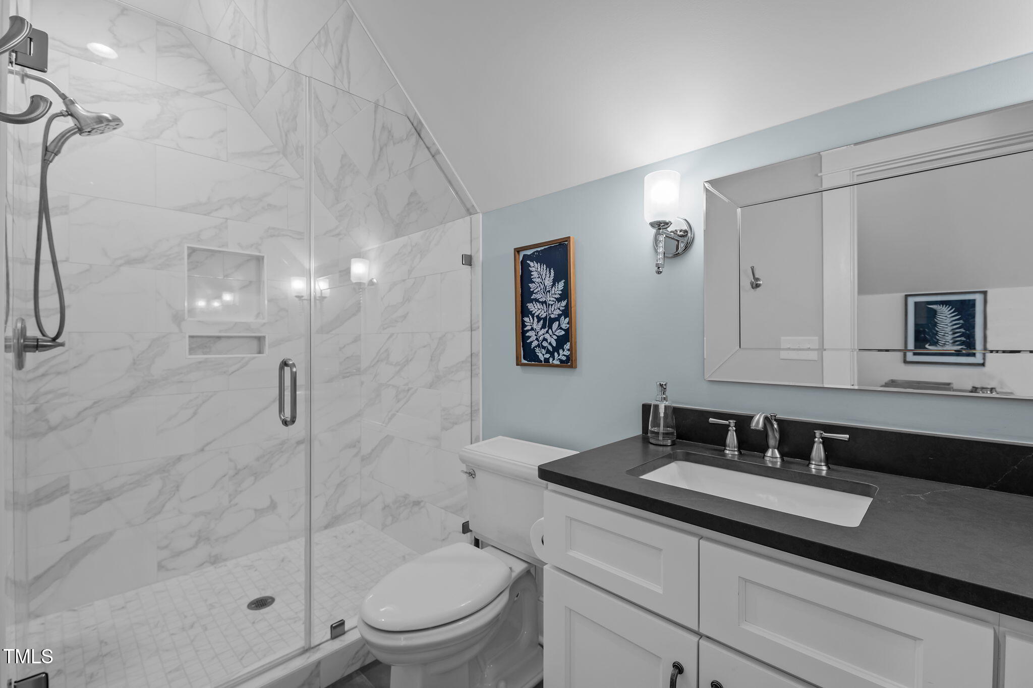 992 Estate Road Semora, NC 27343 - Photo 66 of 77 a bathroom with a granite countertop sink a toilet and shower