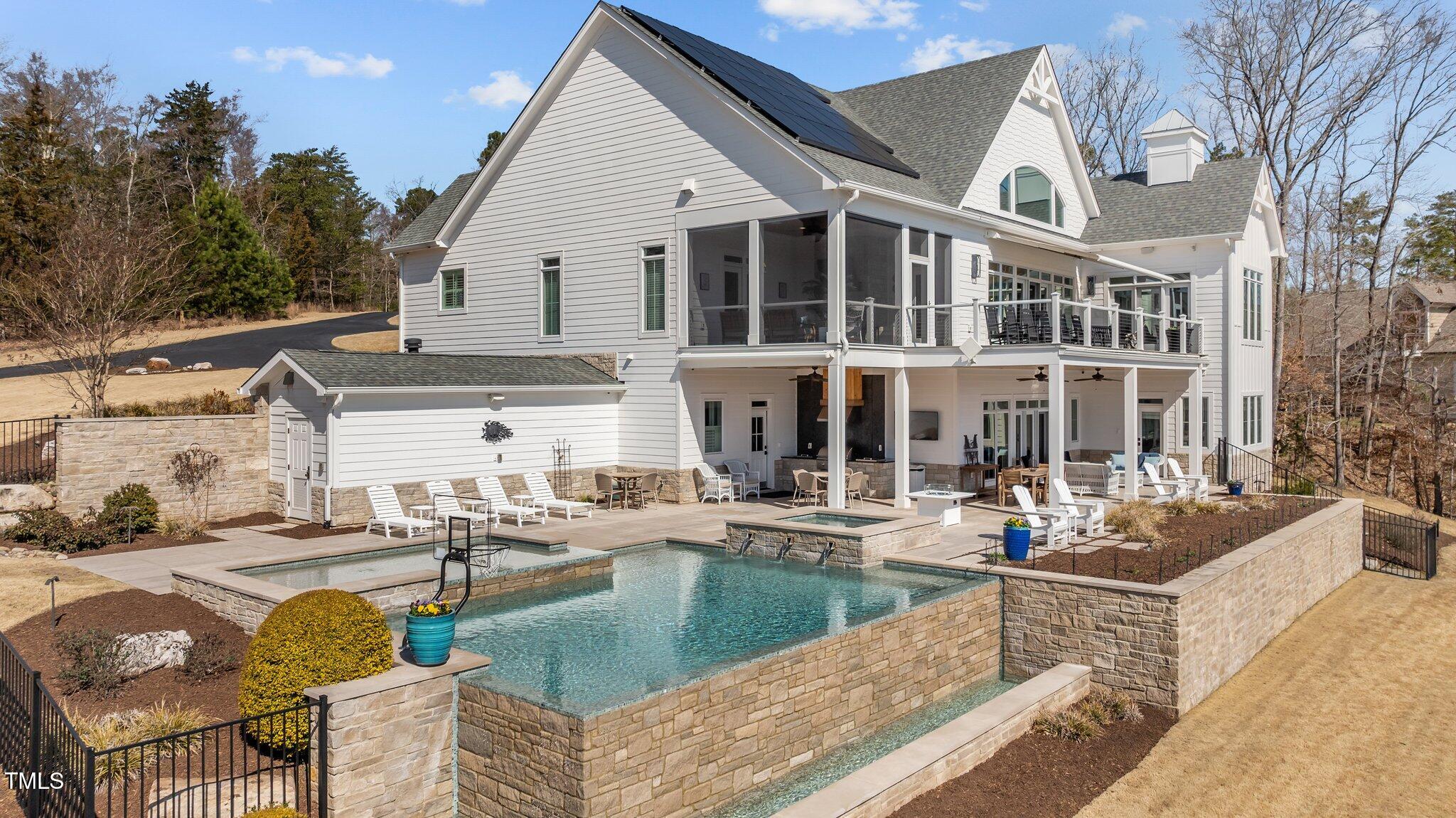 992 Estate Road Semora, NC 27343 - Photo 6 of 77 a view of a swimming pool with outdoor seating