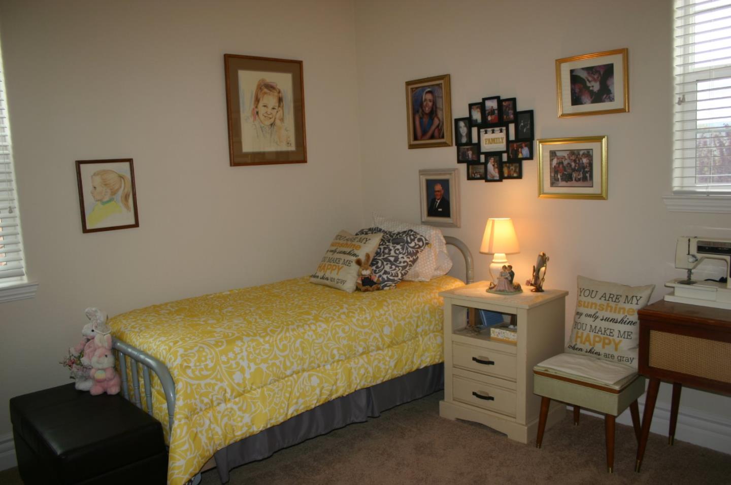 7247 Pitlochry Drive Gilroy, CA 95020 - Photo 20 of 44 a bedroom with a bed and a table in it