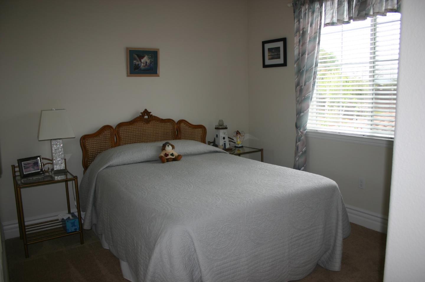 7247 Pitlochry Drive Gilroy, CA 95020 - Photo 22 of 44 a bedroom with a bed and a window