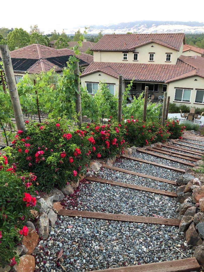 7247 Pitlochry Drive Gilroy, CA 95020 - Photo 32 of 44 a view of a house with a garden