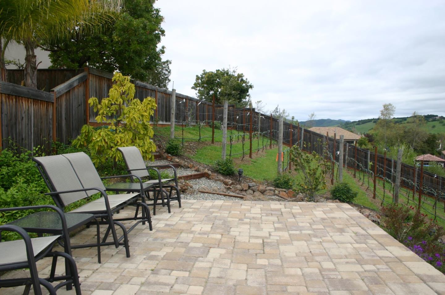 7247 Pitlochry Drive Gilroy, CA 95020 - Photo 34 of 44 a view of a chairs and table in the patio