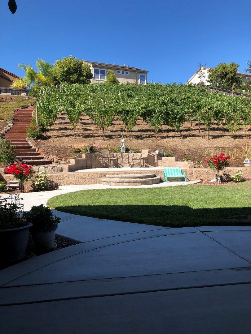 7247 Pitlochry Drive Gilroy, CA 95020 - Photo 35 of 44 a front view of a house with a yard