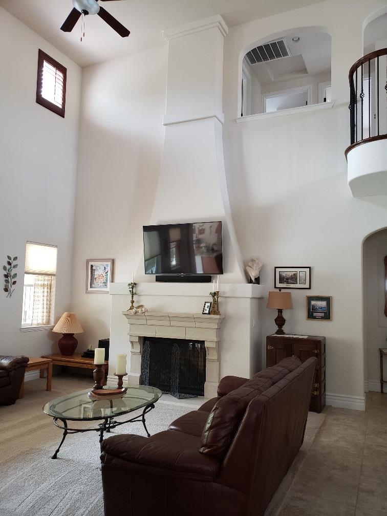 7247 Pitlochry Drive Gilroy, CA 95020 - Photo 4 of 44 a living room with furniture and a fireplace