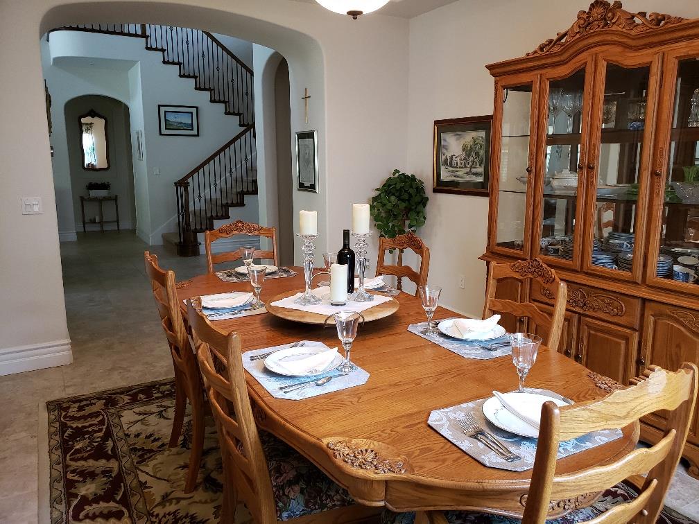 7247 Pitlochry Drive Gilroy, CA 95020 - Photo 6 of 44 a view of a dining room with furniture and wooden floor