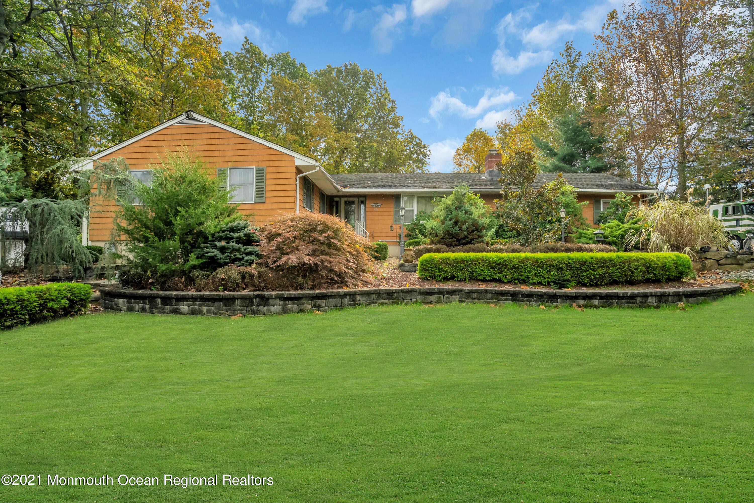 615 West Farms Road Howell, NJ 07731 - Photo 1 of 36 a front view of a house with a yard