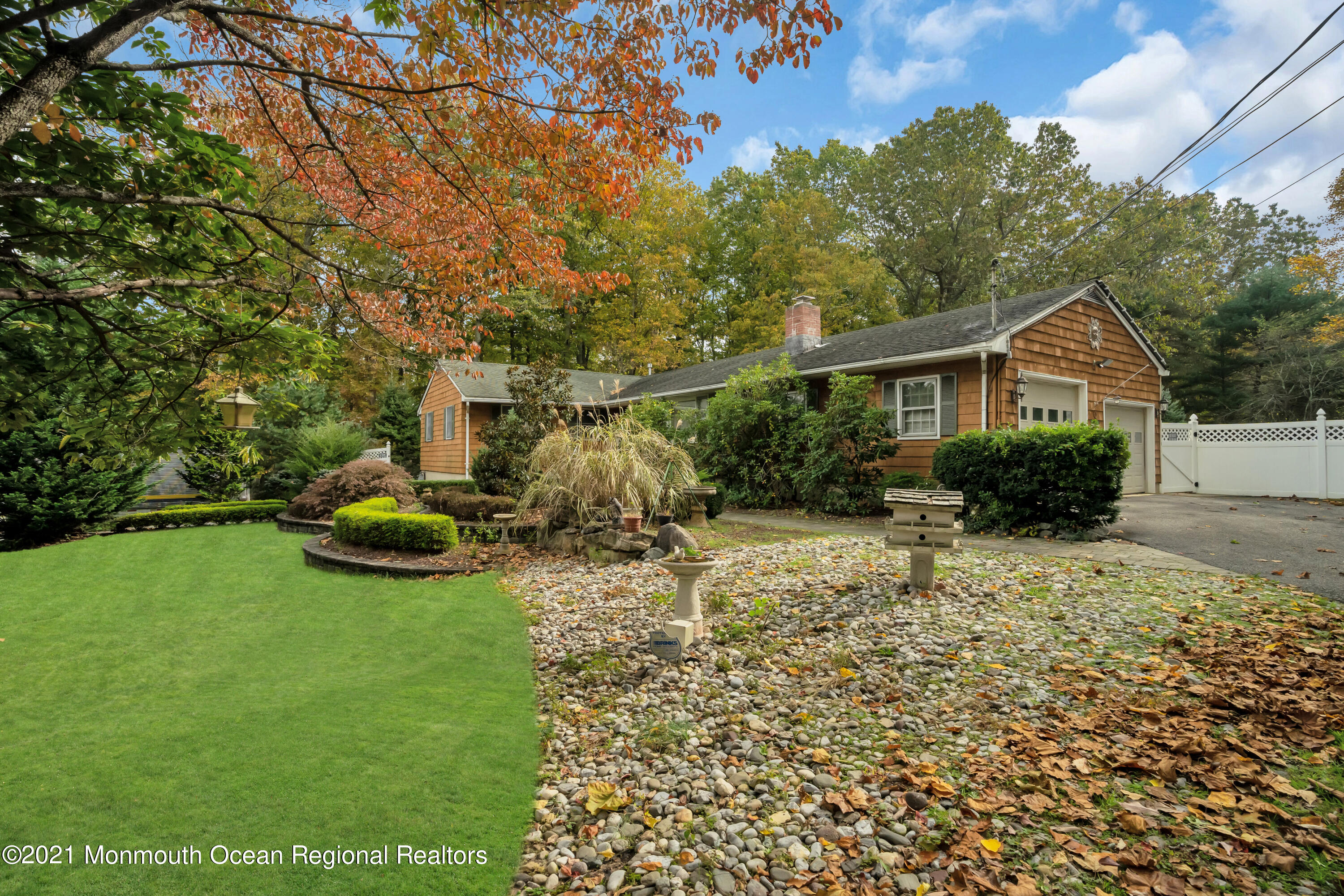 615 West Farms Road Howell, NJ 07731 - Photo 2 of 36 a view of a house with backyard and garden