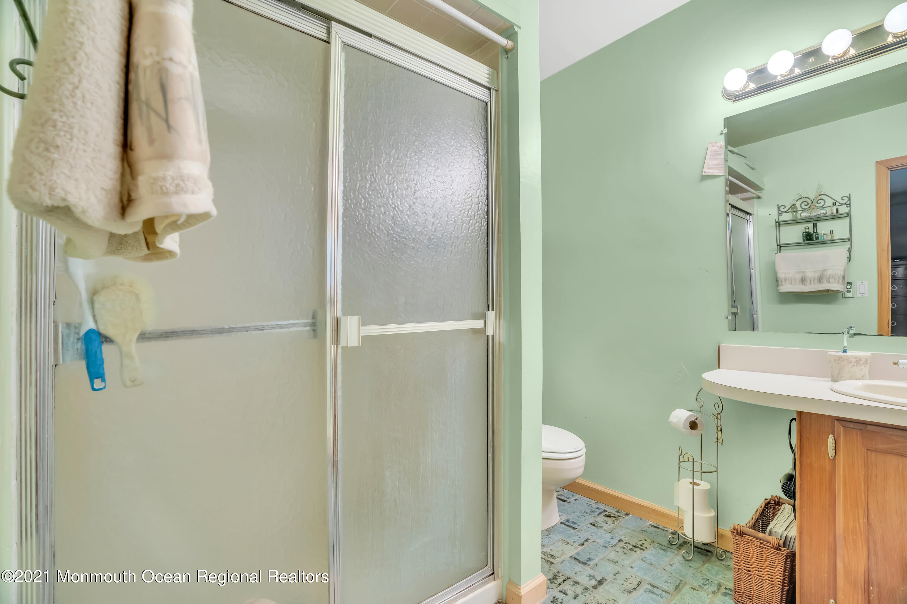 615 West Farms Road Howell, NJ 07731 - Photo 16 of 36 a bathroom with a sink toilet and shower
