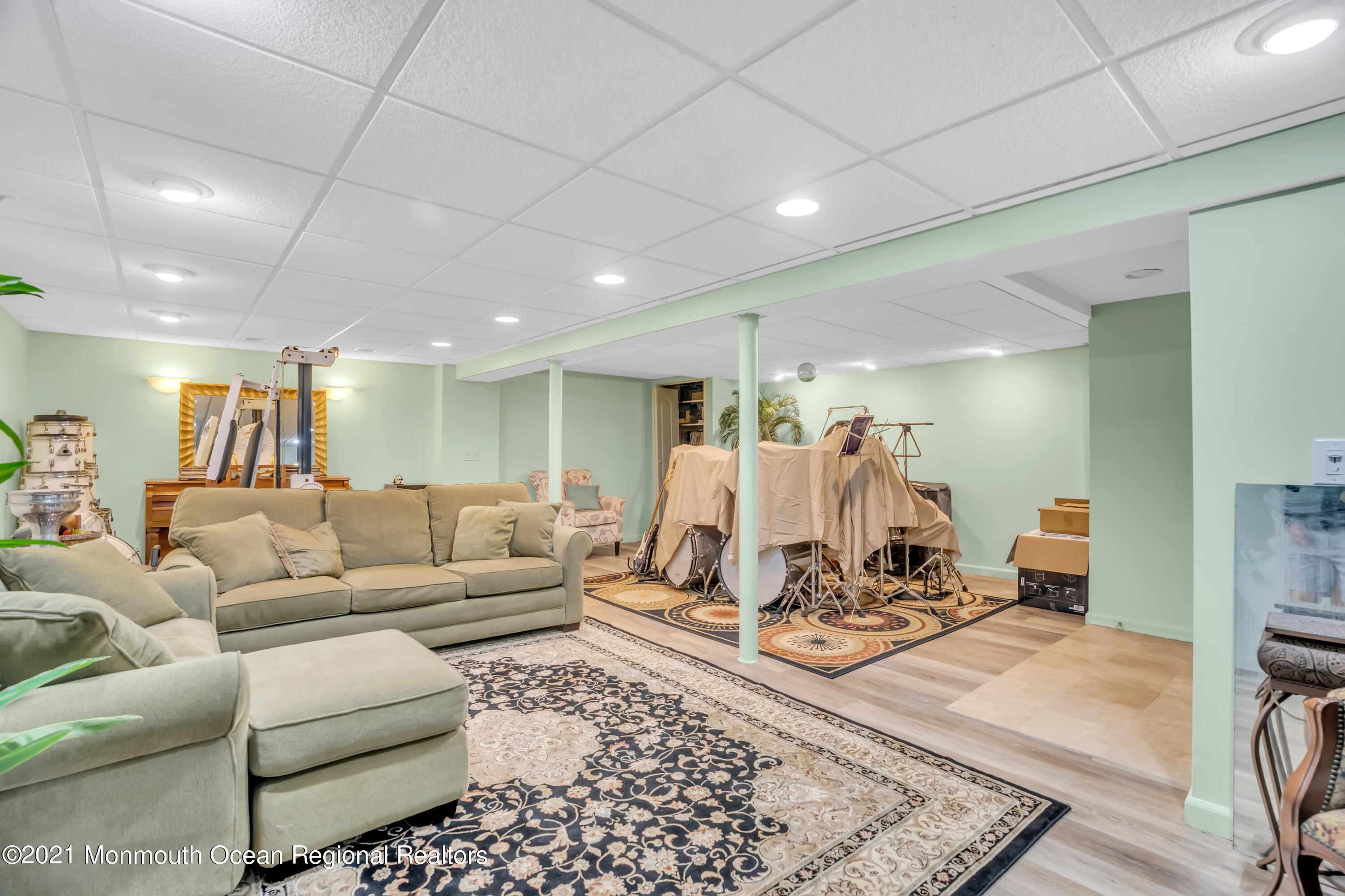 615 West Farms Road Howell, NJ 07731 - Photo 22 of 36 a living room with furniture and wooden floor