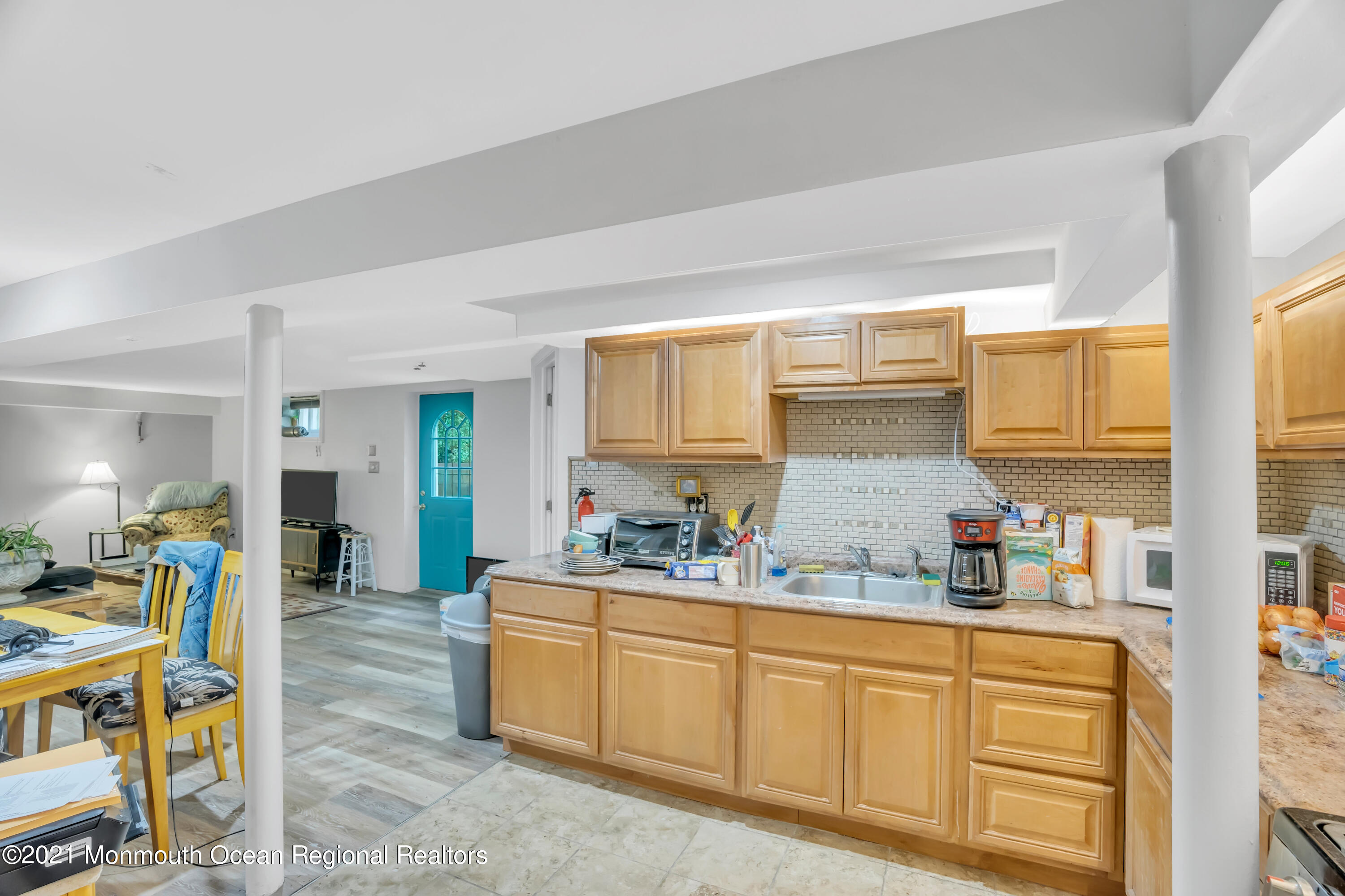 615 West Farms Road Howell, NJ 07731 - Photo 26 of 36 a kitchen with stainless steel appliances sink refrigerator and window