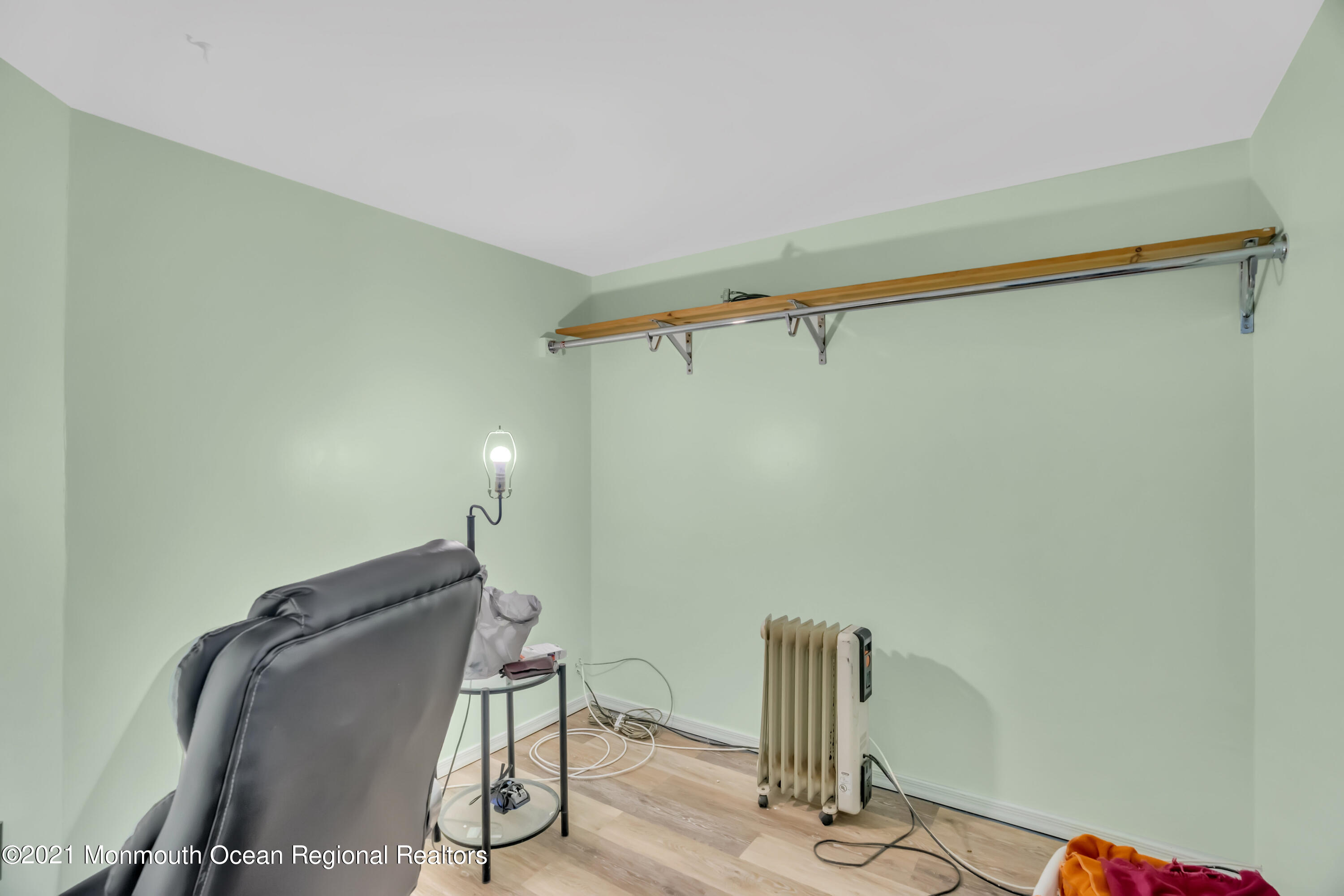 615 West Farms Road Howell, NJ 07731 - Photo 30 of 36 a view of a room with wooden floor and chair