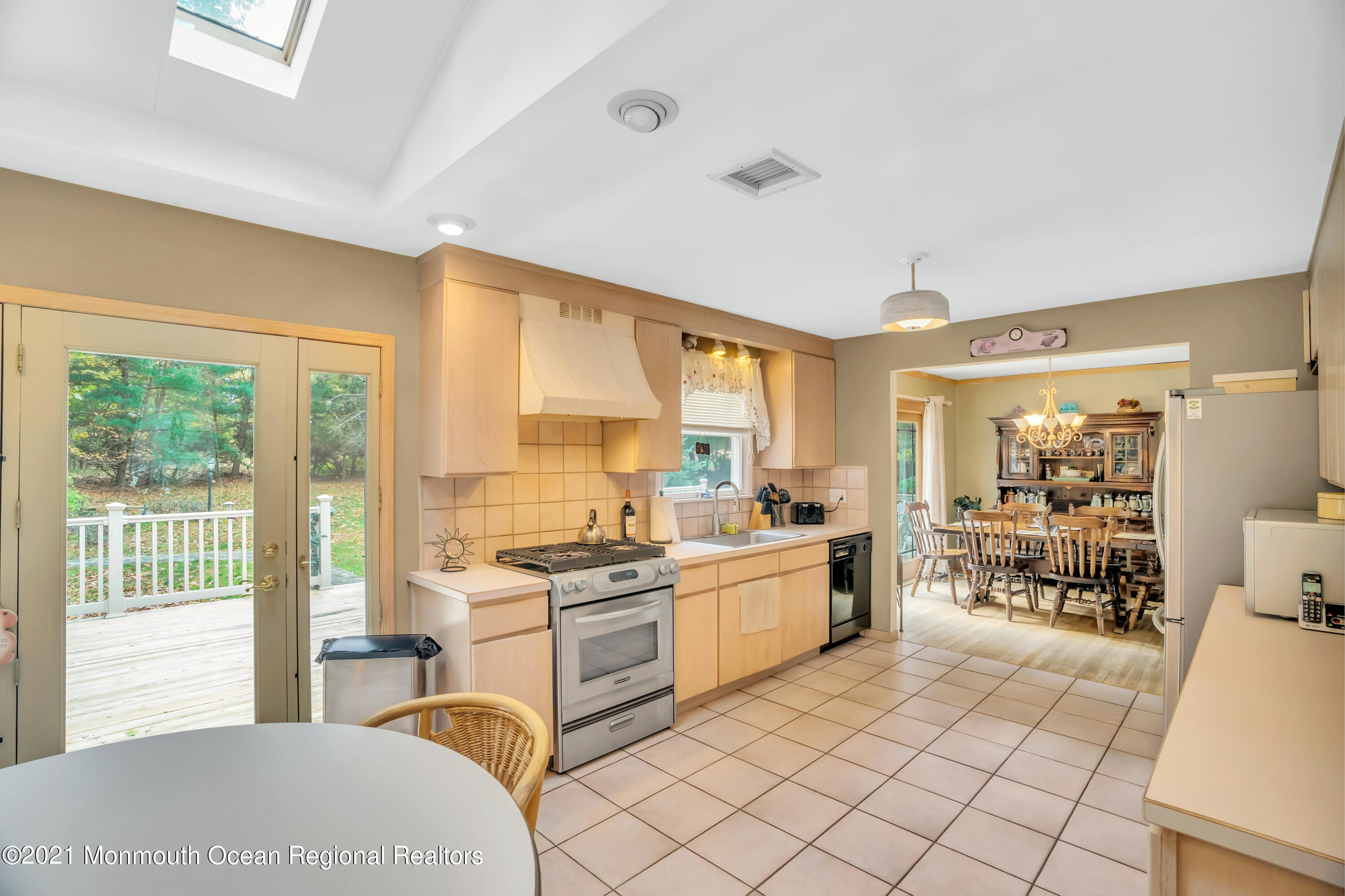 615 West Farms Road Howell, NJ 07731 - Photo 7 of 36 a large white kitchen with a large window