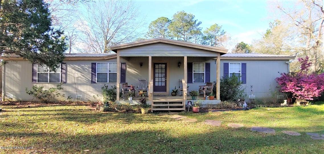 85049 Claxton Road Yulee, FL 32097 - Photo 1 of 37 front view close up