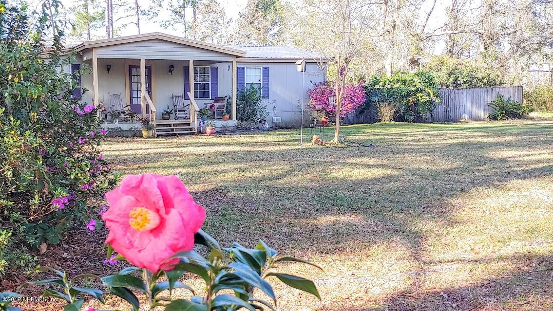 85049 Claxton Road Yulee, FL 32097 - Photo 2 of 37 front flower