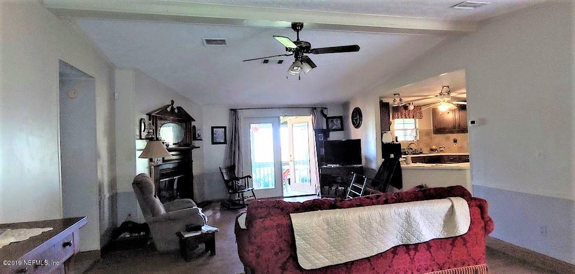 85049 Claxton Road Yulee, FL 32097 - Photo 23 of 37 living room facing back porch