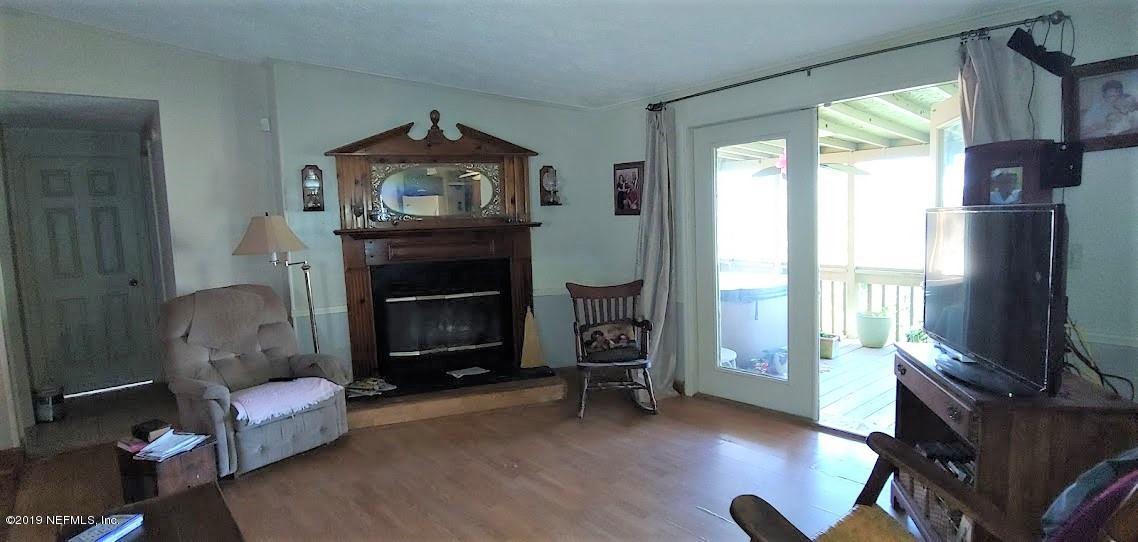 85049 Claxton Road Yulee, FL 32097 - Photo 25 of 37 living room with fireplace