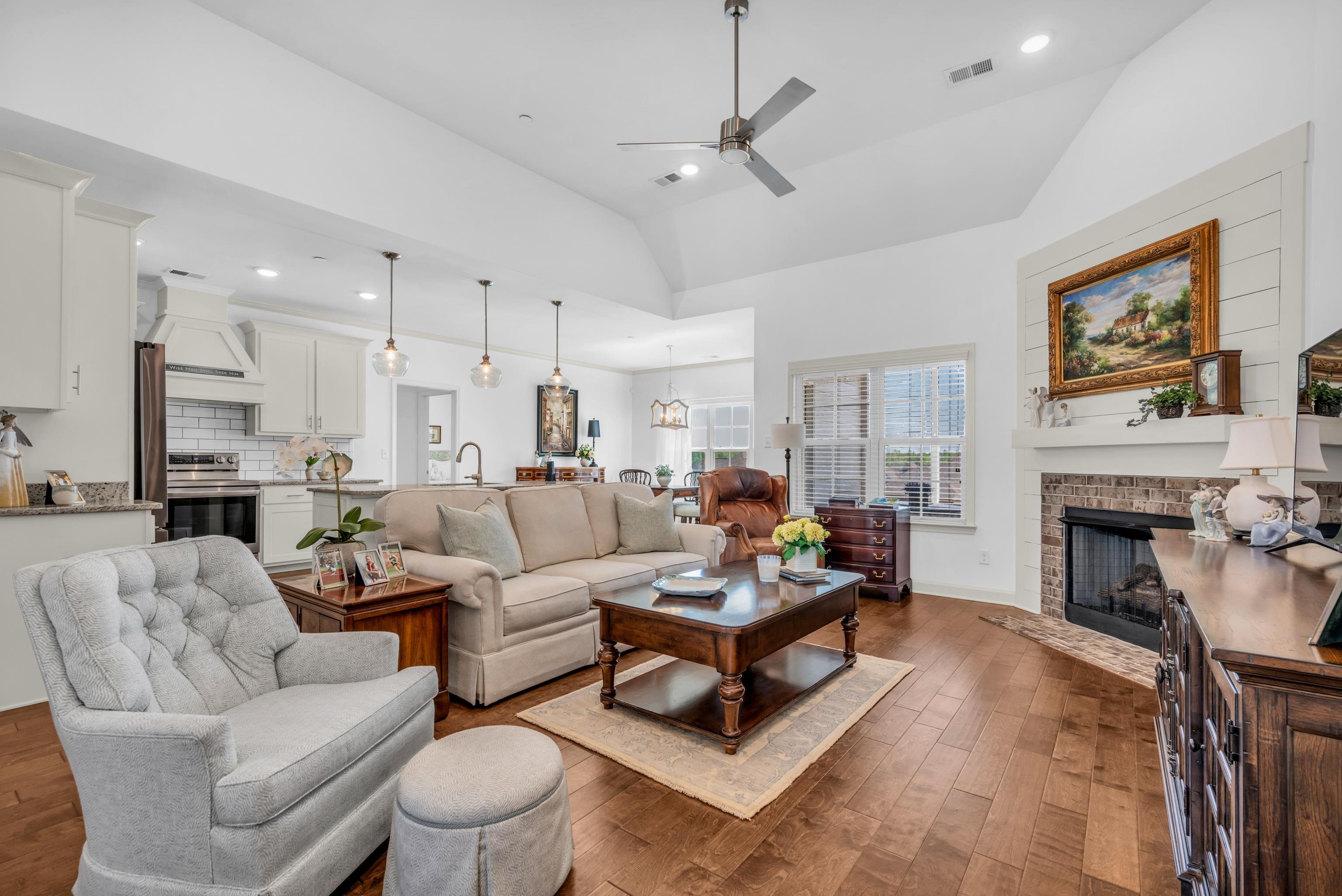 20 Thorpe Cove Piperton, TN 38017 - Photo 11 of 39 a living room with furniture a fireplace and a ceiling fan