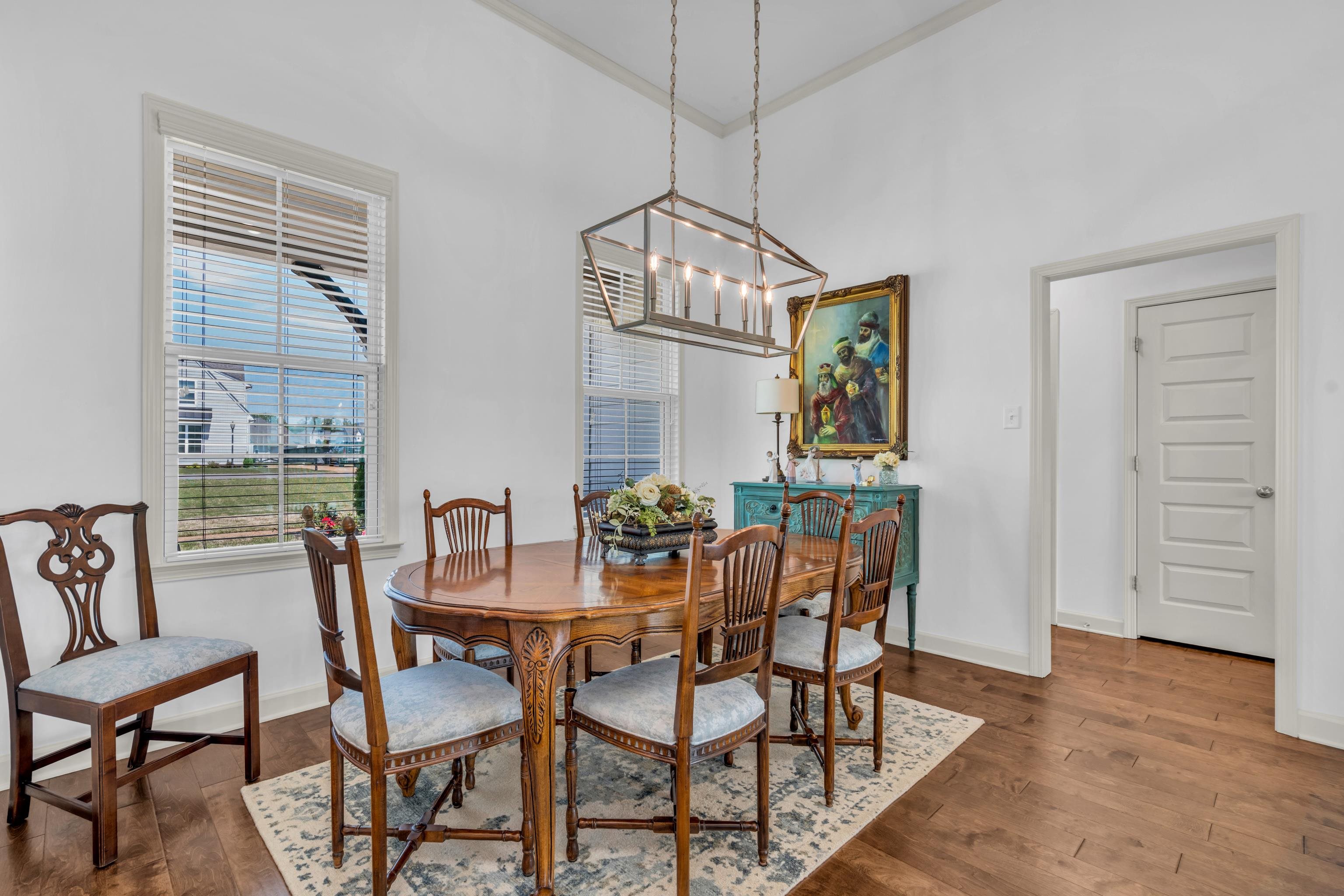 20 Thorpe Cove Piperton, TN 38017 - Photo 13 of 39 a dining room with furniture a chandelier and wooden floor