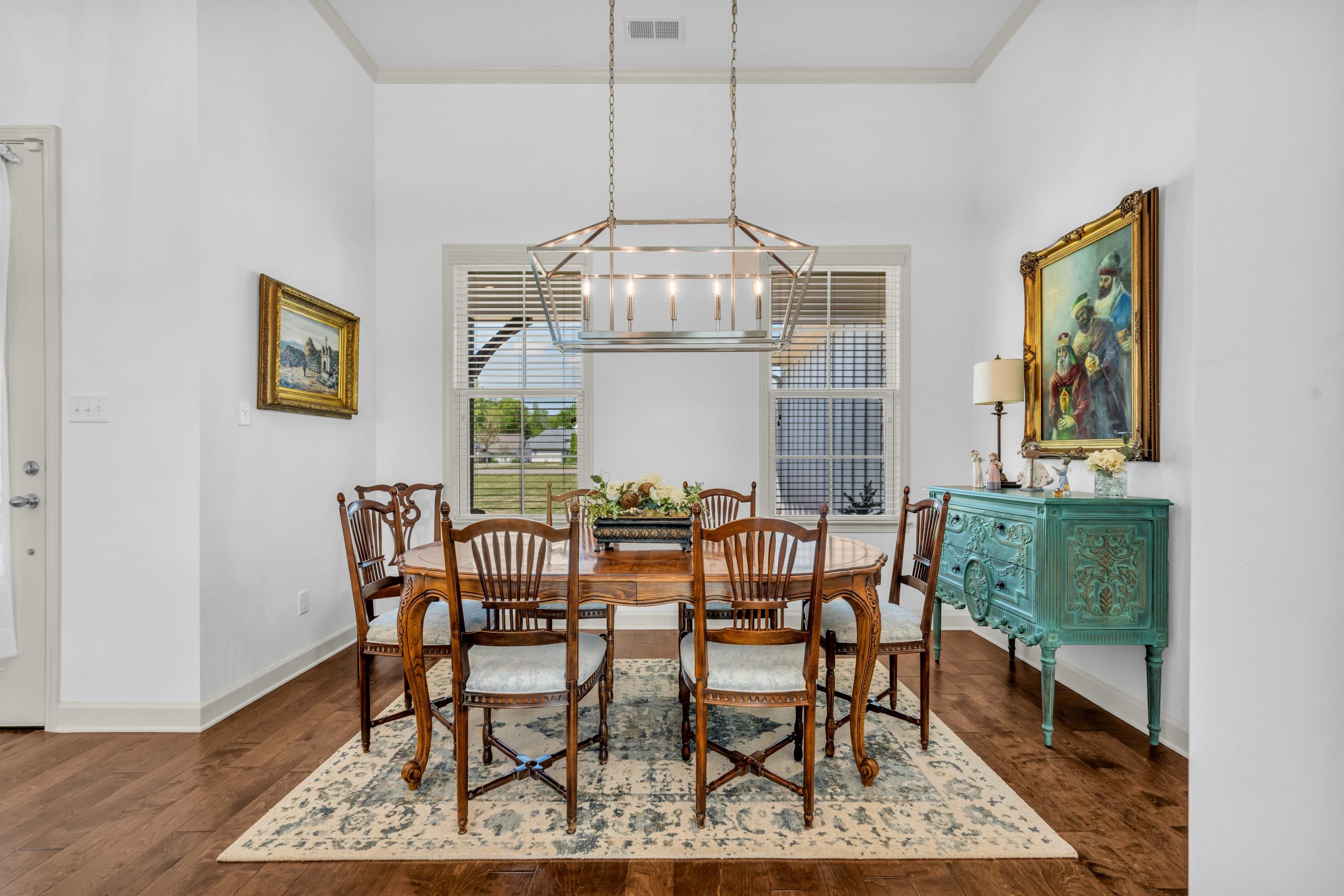 20 Thorpe Cove Piperton, TN 38017 - Photo 14 of 39 a view of a dining room with furniture wooden floor and chandelier
