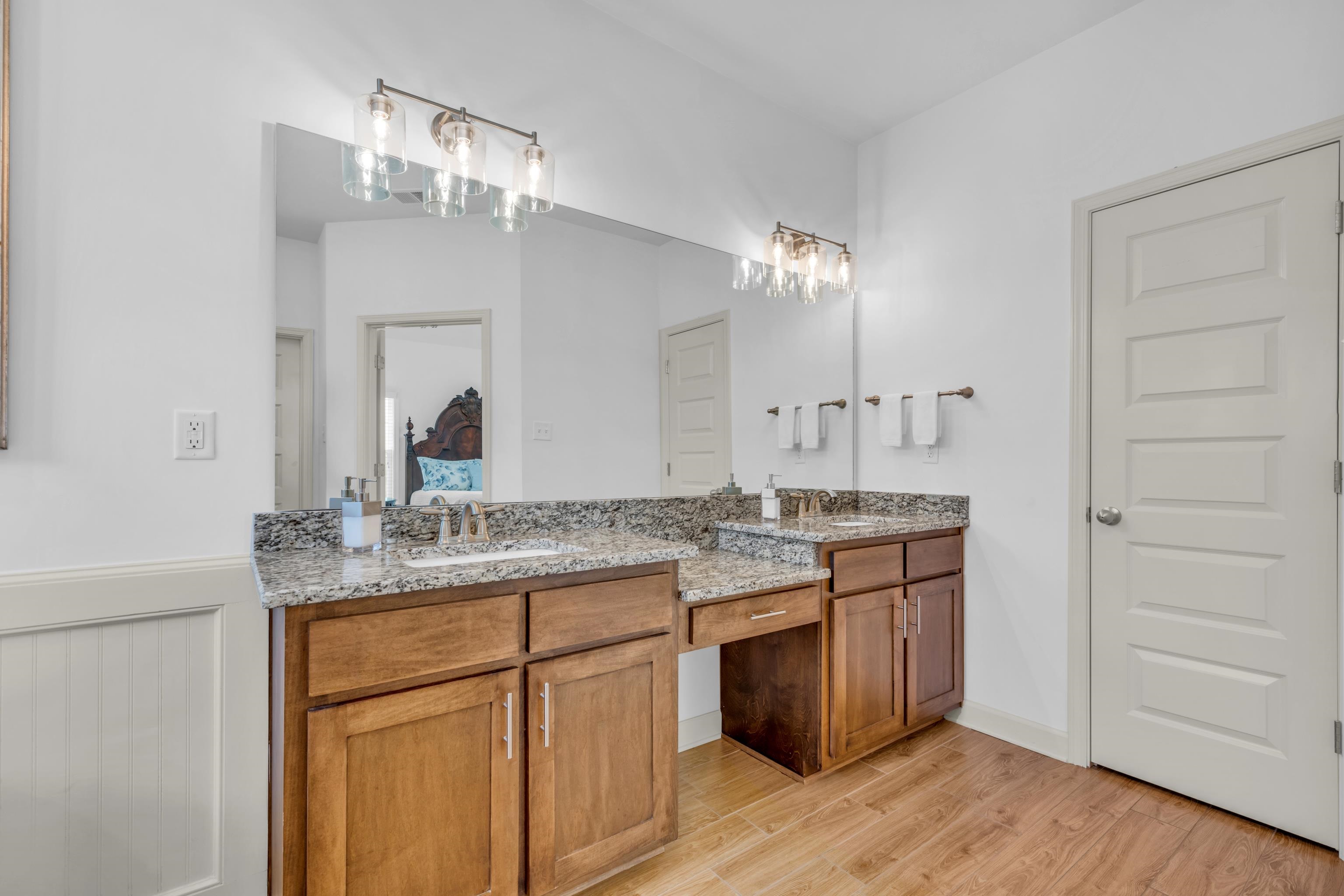 20 Thorpe Cove Piperton, TN 38017 - Photo 25 of 39 a spacious bathroom with a granite countertop sink a mirror and a shower
