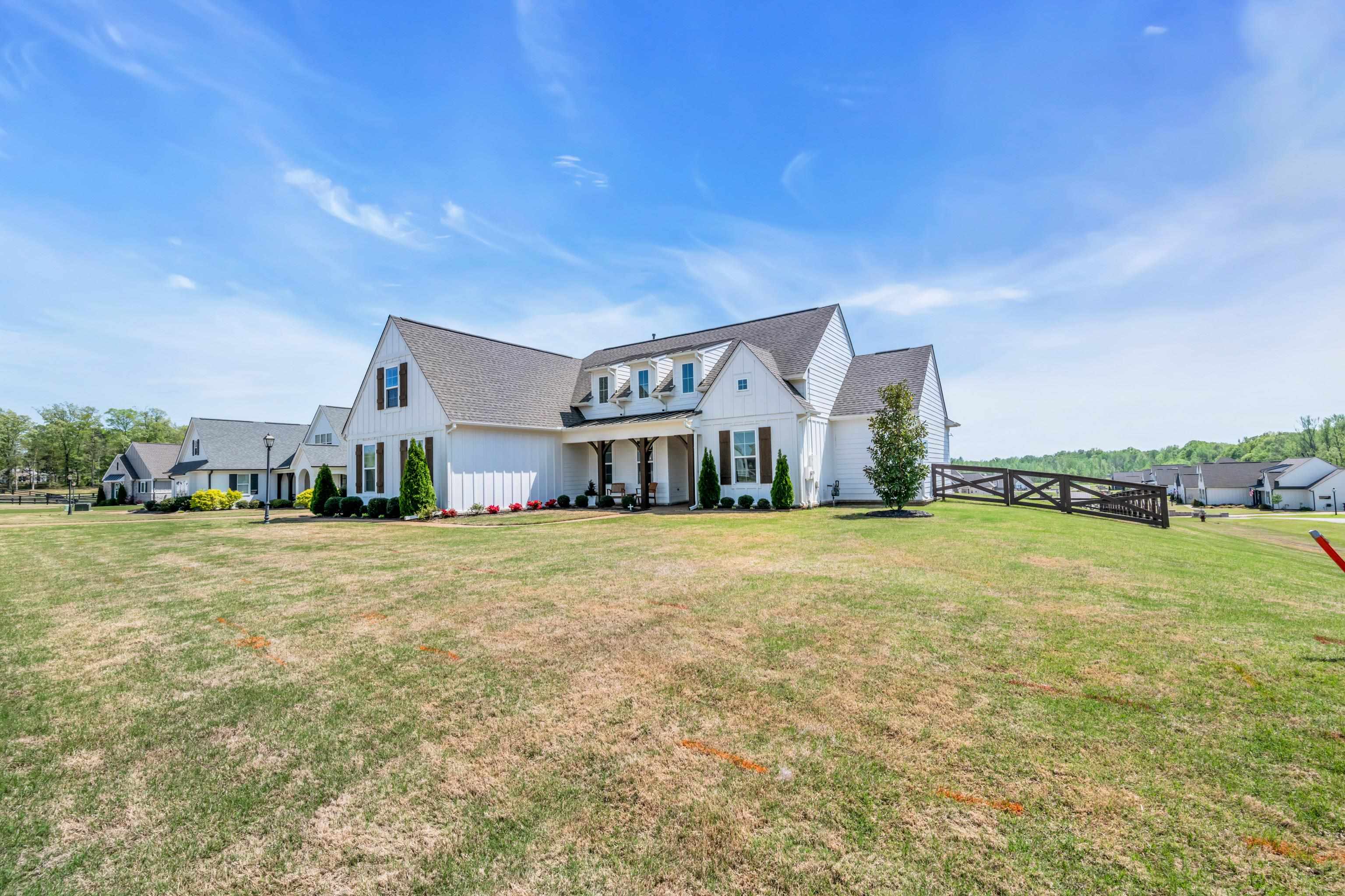20 Thorpe Cove Piperton, TN 38017 - Photo 5 of 39 a front view of house with outdoor space and swimming pool