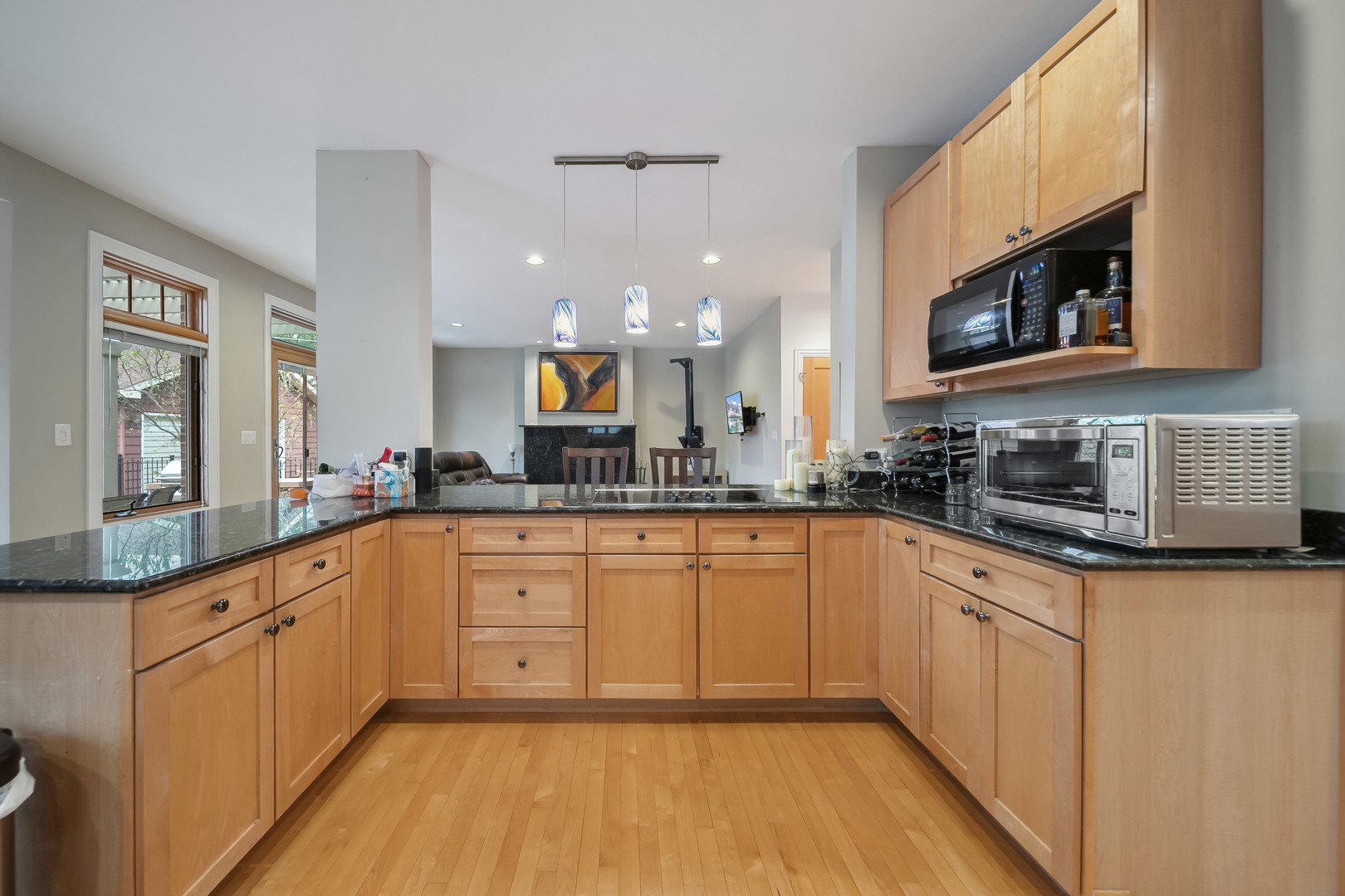 Undisclosed Address Park Ridge, IL 60068 - Photo 12 of 47 a large kitchen with stainless steel appliances granite countertop a stove and a sink