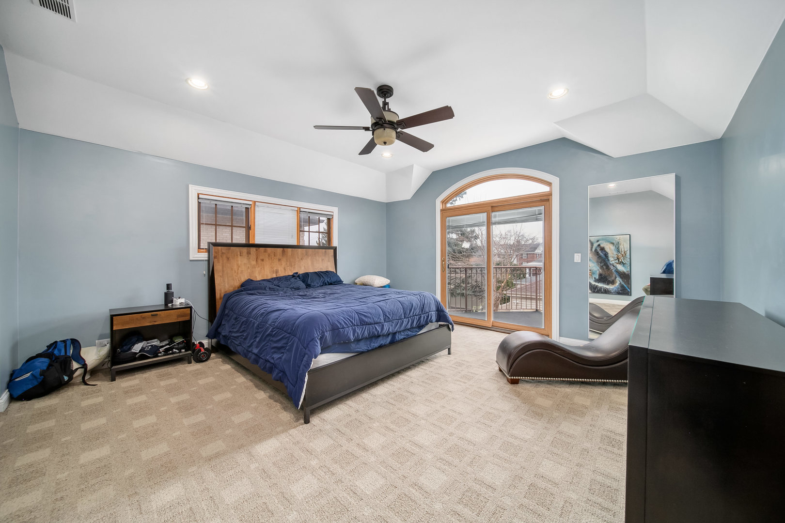 Undisclosed Address Park Ridge, IL 60068 - Photo 19 of 47 a bedroom with a bed and glass walk in closet