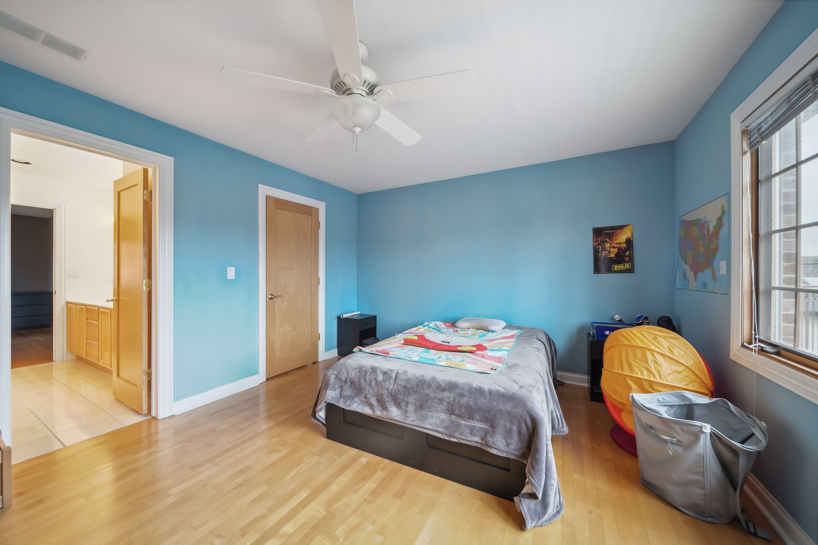 Undisclosed Address Park Ridge, IL 60068 - Photo 30 of 47 a bedroom with bed and wooden floor