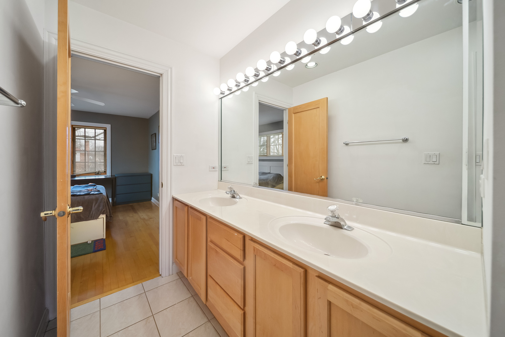 Undisclosed Address Park Ridge, IL 60068 - Photo 33 of 47 a spacious bathroom with a sink double vanity and a mirror